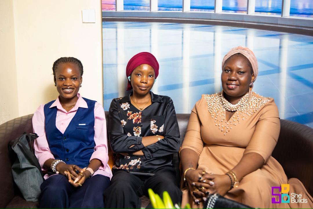 Three community members seated together